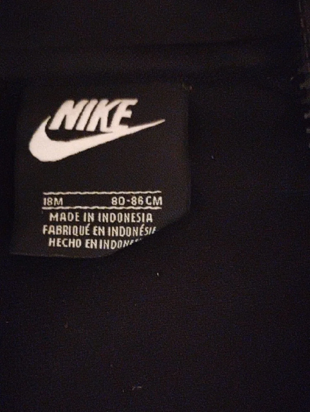 Nike Black Kids Track Jacket with Orange and Yellow Stripe